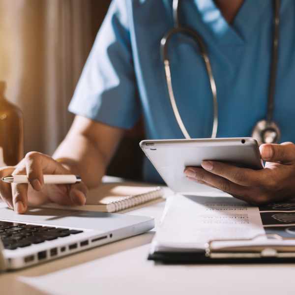 Nurse working on laptop